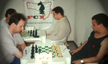 Federação Catarinense de Xadrez - FCX - O campeão Pablo Sell x Haroldo Cunha. Ao fundo jogam Jorge Godóis x André Achutti.